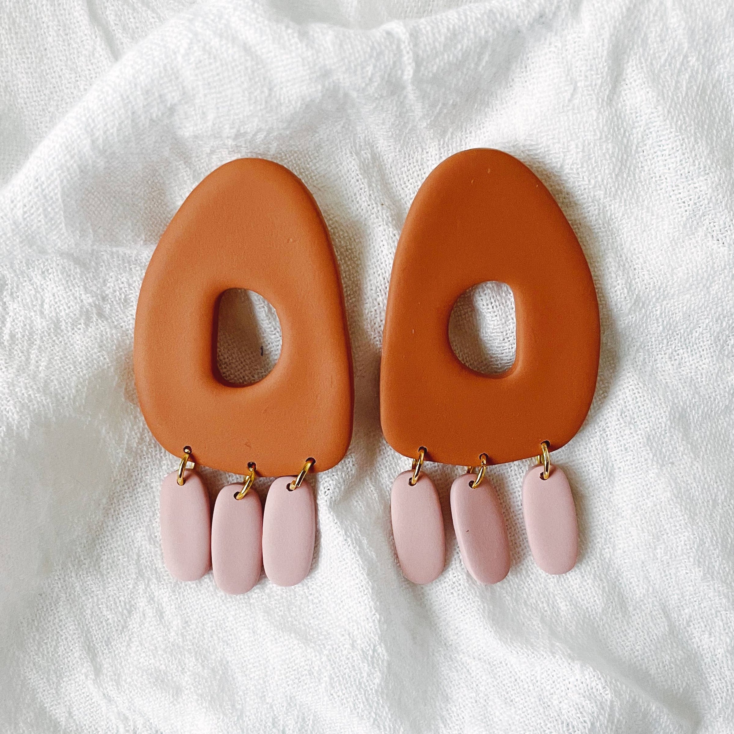 Boob sales clay earrings